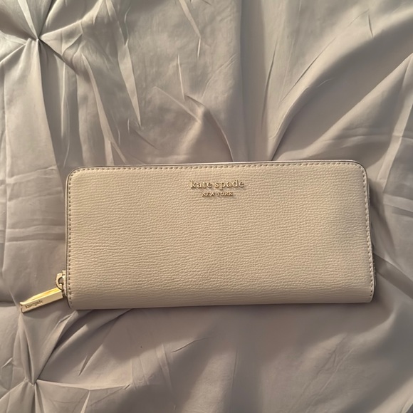 kate spade Handbags - Kate Spade Cream Leather Wallet with Gold Zipper